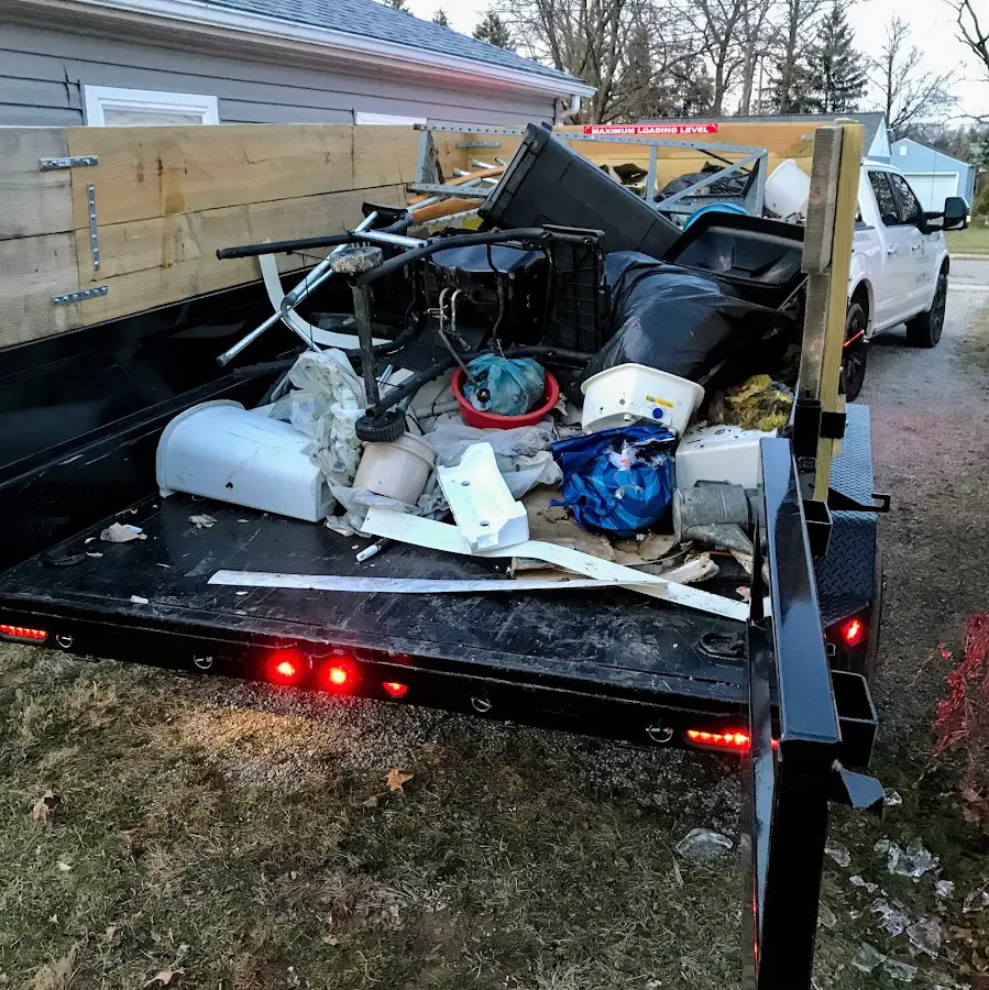Roll-off dumpster delivered to a residential driveway in Cold Springs