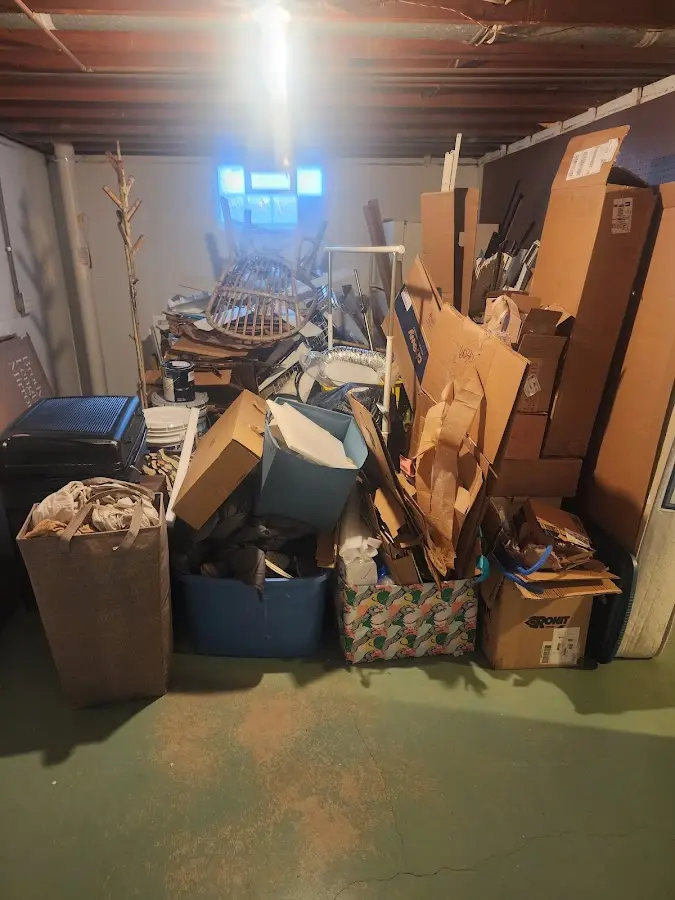 Roll-off dumpster container at job site for Yard Waste Dumpster Rental in Cold Springs